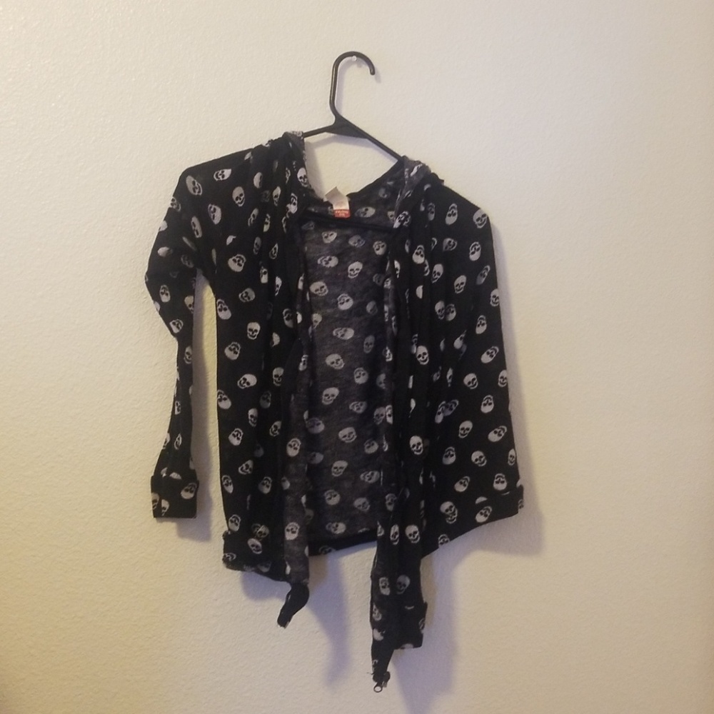 Skull over coat